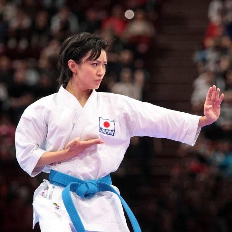 Female karateka performing kata